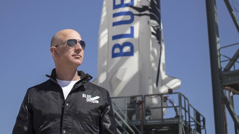 This file handout photo taken on April 24, 2015 obtained courtesy of Blue Origin shows Jeff Bezos, founder of Blue Origin, at New Shepard's West Texas launch facility before the rocket's maiden voyage. AFP PHOTO/BLUE ORIGIN