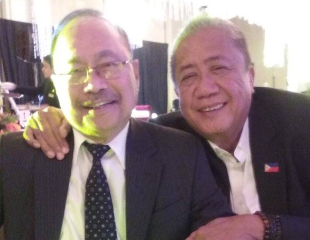 Le juge Bertulfo avec le secrétaire du DOTr Arthur Tugade