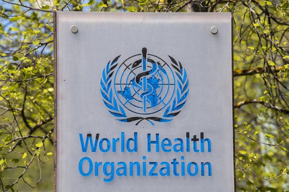 The logo and building of the World Health Organization (WHO) headquarters in Geneva, Switzerland, 15 April 2020. WHO said it’s creating a global training center to help poorer countries make vaccines, antibodies and cancer treatments using the messenger RNA technology used to make COVID-19 vaccines. At a press briefing Wednesday, Feb. 23, 2022 the U.N. health agency said the new hub will be based in South Korea and will share mRNA technology being developed by WHO and partners in South Africa, where scientists are already working to recreate the COVID-19 vaccine made by Moderna Inc. AP FILE PHOTO