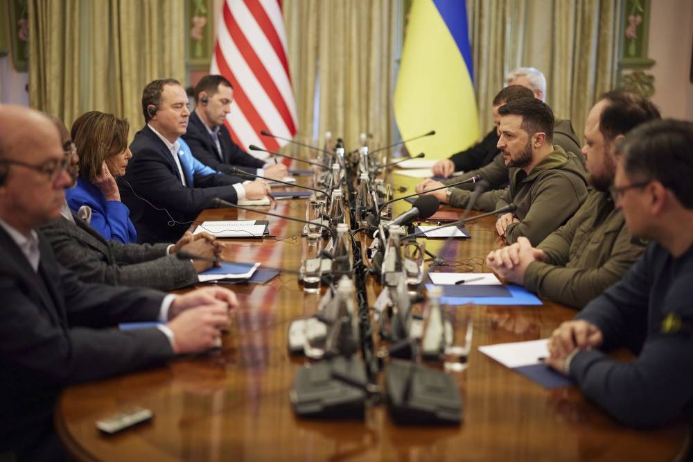 In this image released by the Ukrainian Presidential Press Office on Sunday, May 1, 2022, Ukrainian President Volodymyr Zelenskyy (third from right) and US Speaker of the House Nancy Pelosi (third from left) talk during their meeting in Kyiv, Ukraine, Saturday, April 30, 2022. PHOTO BY UKRAINIAN PRESIDENTIAL PRESS VIA AP 