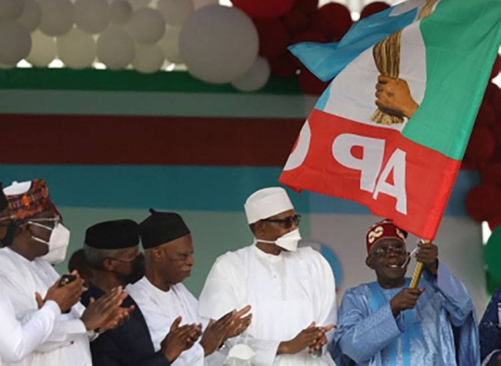 Nigeria ruling party (All Progressive Congress) presidential flagbearer, Bola Tinubu (middle) is flanked by Nigeria President Muhammadu Buhari (center) and APC Chairman Abdullahi Adamu (right) after the party announces Tinubu as the winner of its presidential primary during APC special convention to elect the party's presidential flag bearer for 2023 election at the Eagle Square in Abuja, Nigeria on June 8, 2022. Nigeria: Gunmen killed 32 people and razed dozens of houses in the latest attacks in Nigeria's volatile northwestern state of Kaduna, local authorities said on Thursday (Friday, June 10, 2022 in Manila).