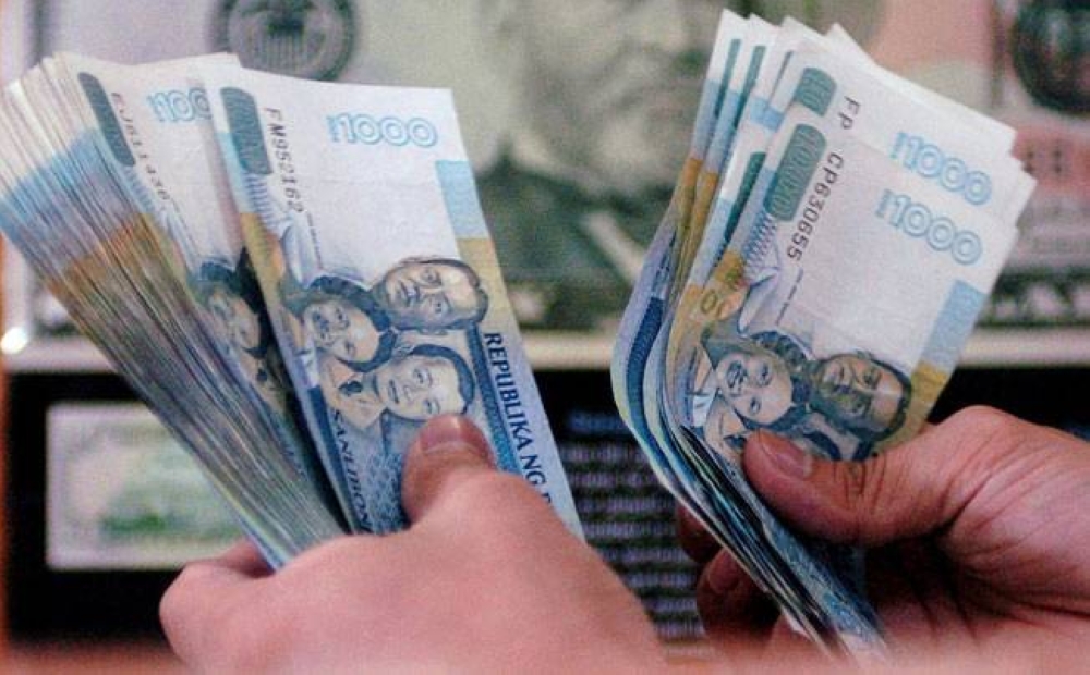 Peso takes a beating against dollar | The Manila Times