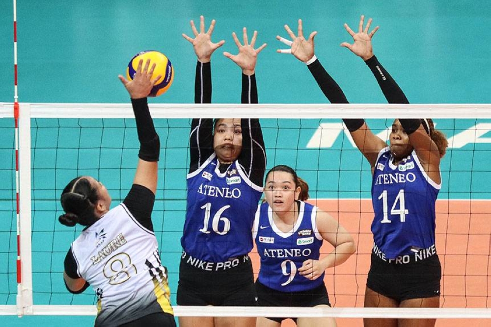Ateneo wins over UST in three straight sets, 25-23, 25-23, 25-20, during the stepladder match for the UAAP Season 84 Women's Volleyball finals at the Mall of Asia Arena in Pasay City, Tuesday evening. PHOTO BY J. GERARD SEGUIA 
