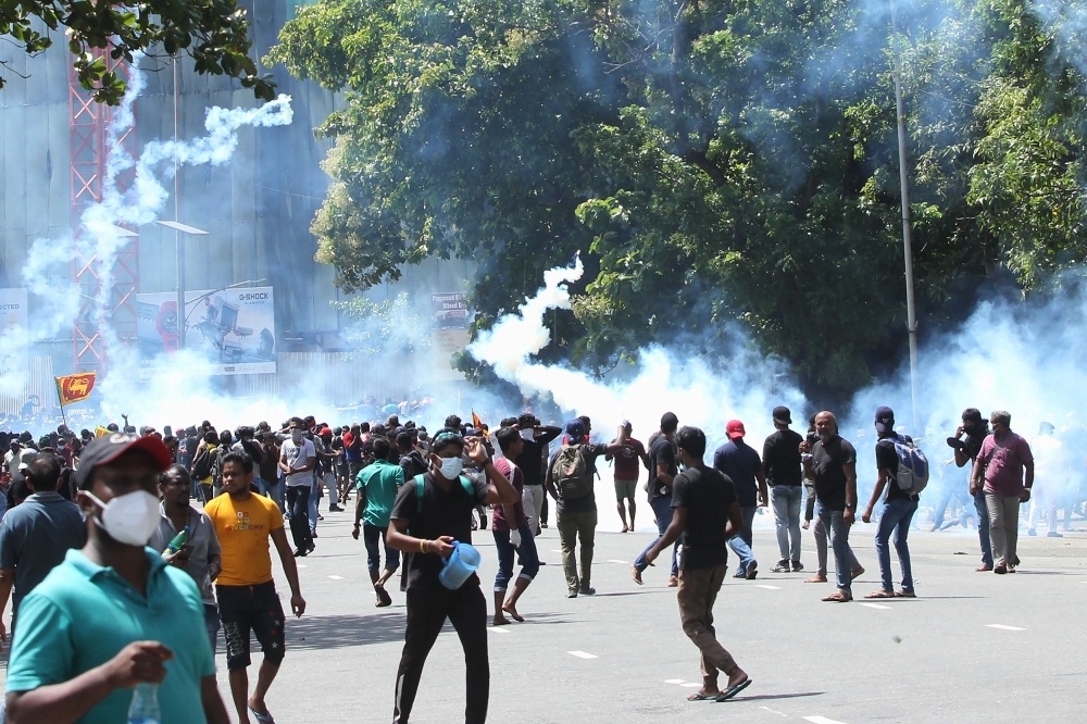 CONTINUING UNREST Police use tear gas to disperse protesters demanding the resignation of Sri Lanka’s President Gotabaya Rajapaksa in Colombo on July 9, 2022. Sri Lanka’s beleaguered Rajapaksa fled his official residence in Colombo, a top defense source told Agence France-Presse, before protesters gathered to demand his resignation stormed the compound. AFP PHOTO