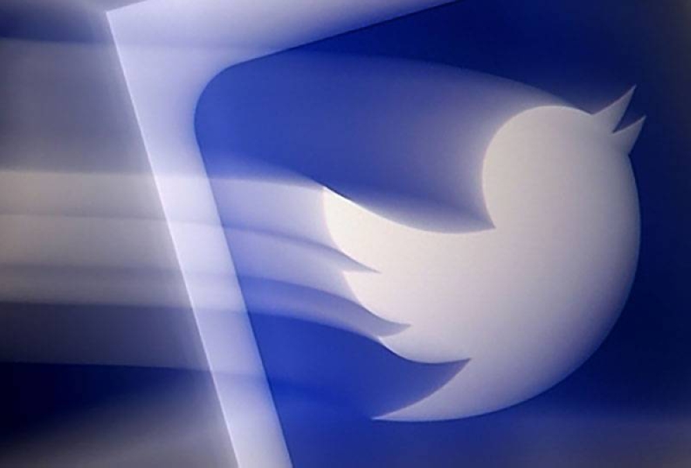 In this file photo illustration taken on Aug. 10, 2020, a Twitter logo is displayed on a mobile phone in Arlington, Virginia. A seven-month ban on Twitter use in Nigeria was unlawful, according to a court ruling by West Africa's regional bloc ECOWAS seen by Agence France-Presse on Thursday (Friday in Manila). AFP PHOTO