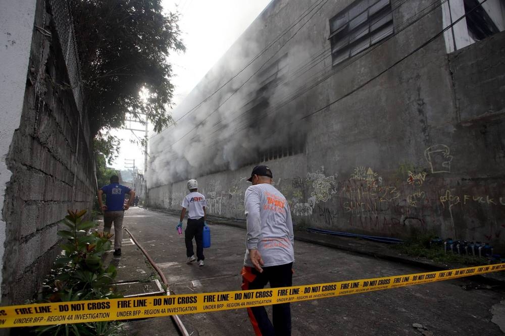 A fire broke out in a textile warehouse on 5th street, Sitio Burol, Brgy. San Juan, Taytay, Rizal. BFP Taytay has been extinguishing the fire that broke out around 12:30 am for more than six hours now. According to BFP Taytay, it will be difficult for them to put out the fire because the textile and plastic warehouse is full. Moreover, there were also fallen rocks from the second floor of the warehouse. BFP had earlier said that it feared a structural collapse in the building due to its broken roof. It was learned that the third alarm reached the fire at 1:14 p.m. The source of the fire as well as the amount of its damage are still being determined. Photos by John Orven Verdote
