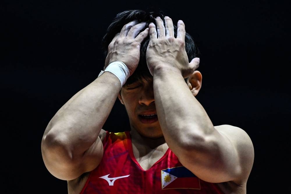 Yulo fails to defend vault title, settles for silver | The Manila Times