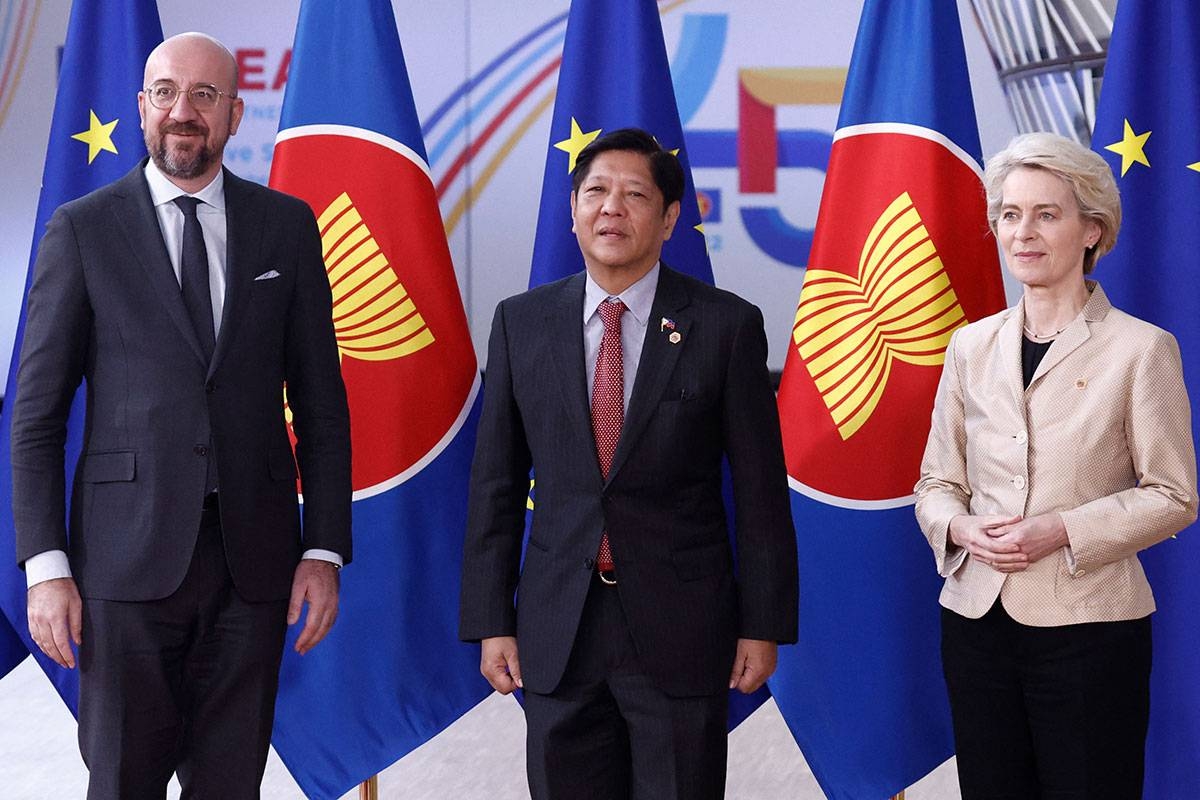 Philippines' president Ferdinand Romualdez Marcos Jr (C) poses with President of the European Council Charles Michel (L) and President of the European Commission Ursula von der Leyen at the EU-ASEAN (Association of Southeast Asian Nations) summit at the European Council headquarters in Brussels on December 14, 2022. EU leaders meet their counterparts from Southeast Asia for a summit in Brussels on Wednesday, looking to bolster ties in the face of the war in Ukraine and challenges from China. Kenzo TRIBOUILLARD / AFP