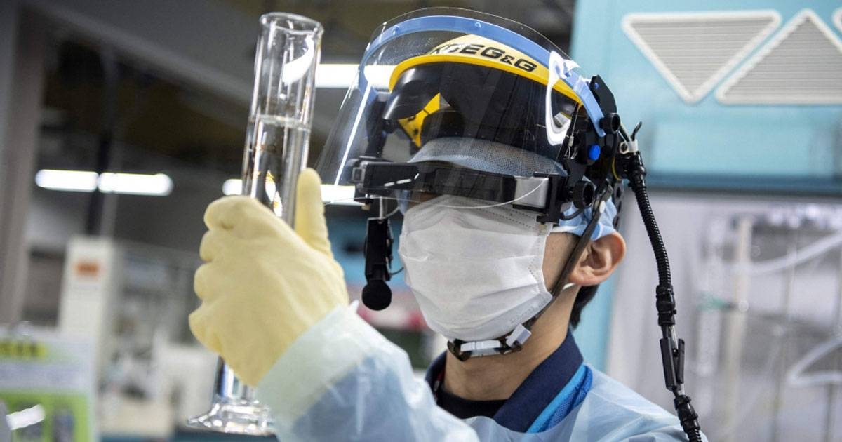 DEADLY LIQUID This file picture, taken on March 5, 2022, shows an employee conducting a tritium measurement on a sample of contaminated water at the Tokyo Electric Power Company (Tepco) Fukushima Dai-ichi nuclear power plant in Okuma, Fukushima prefecture. Japan plans to start releasing more than a million tons of treated water from the crippled Fukushima nuclear power plant into the ocean this year, a top government spokesman said on Friday, Jan. 13, 2023. AFP PHOTO