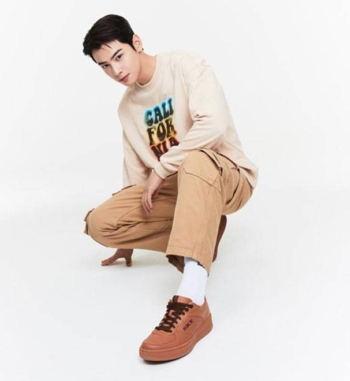 Cha Eun-woo Pops in Logo Sneakers at Dior's Fall 2023 Menswear Show –  Footwear News