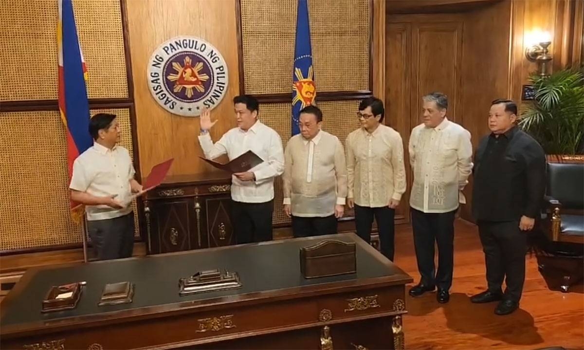 President Ferdinand R. Marcos Jr. administers the oath of office to Valenzuela 1st District Rep. Rex Gatchalian at Malacañan Palace in Manila on Tuesday. Screengrab from the Presidential Communications Office
