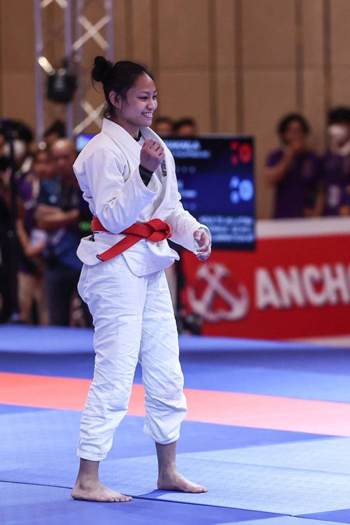 Kaila Napolis of the Philippines reacts after scoring a victory over Thi Huyen of Vietnam in their semifinal duel in jiu-jitsu at the 32nd Southeast Asian Games on Thursday, May 4, in Cambodia. PHOTO BY RIO DELUVIO