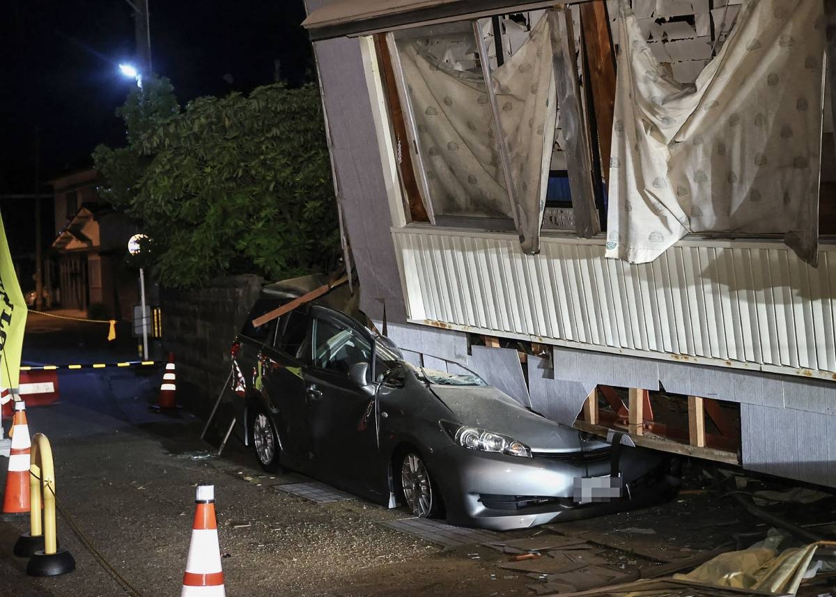 A strong earthquake kills people and destroys homes in Japan