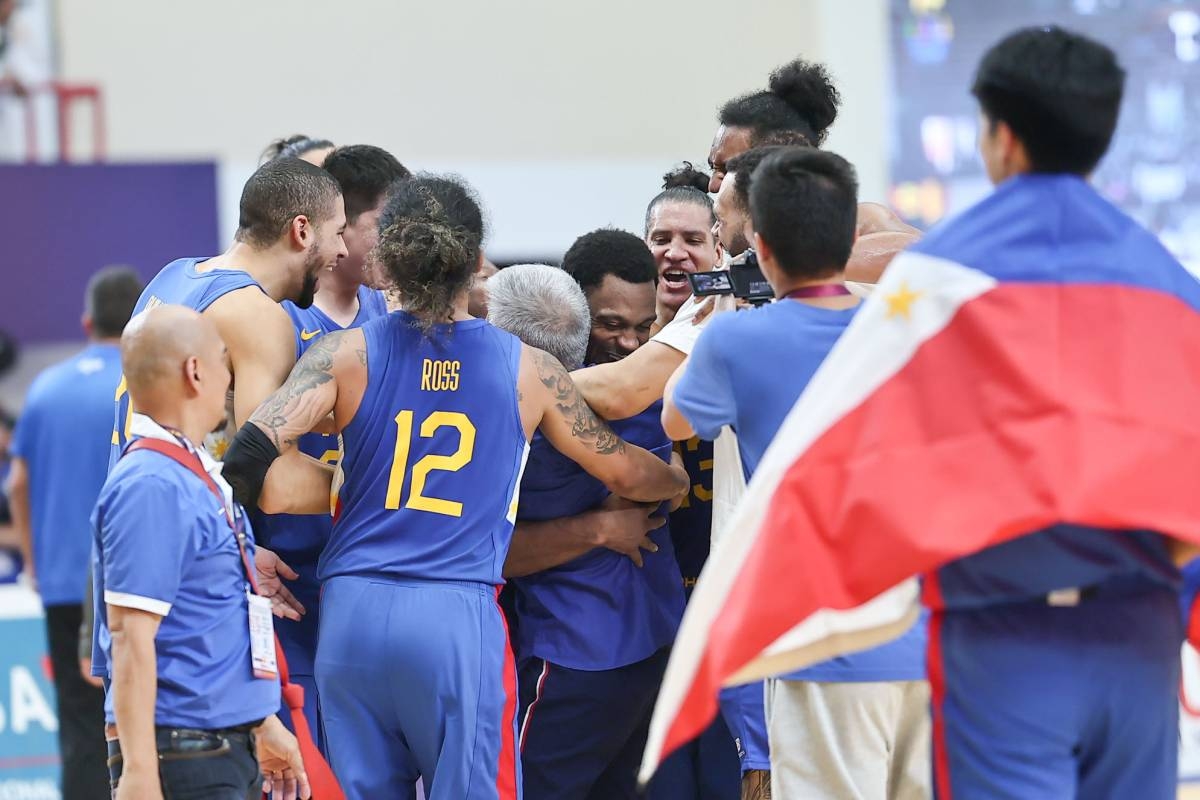 Gilas Pilipinas celebrates after reclaiming the gold medal in the 32nd Southeast Asian Games men’s basketball on Tuesday, May 16, 2023, in Phnom Penh, Cambodia. PHOTO BY RIO DELUVIO