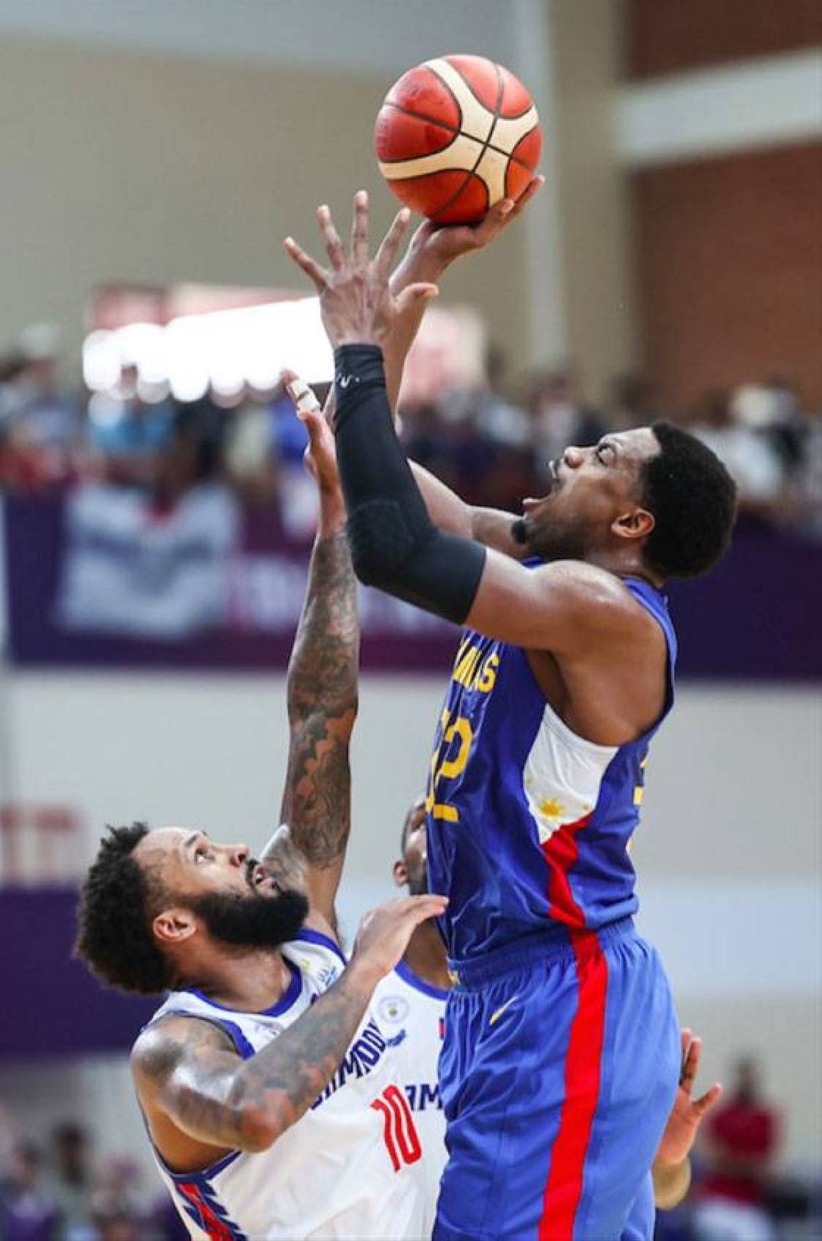Justin Brownlee shoots over a Cambodian player during the 32nd Southeast Asian Games men’s basketball finals on Tuesday, May 16, 2023, in Phnom Penh, Cambodia. PHOTO BY RIO DELUVIO