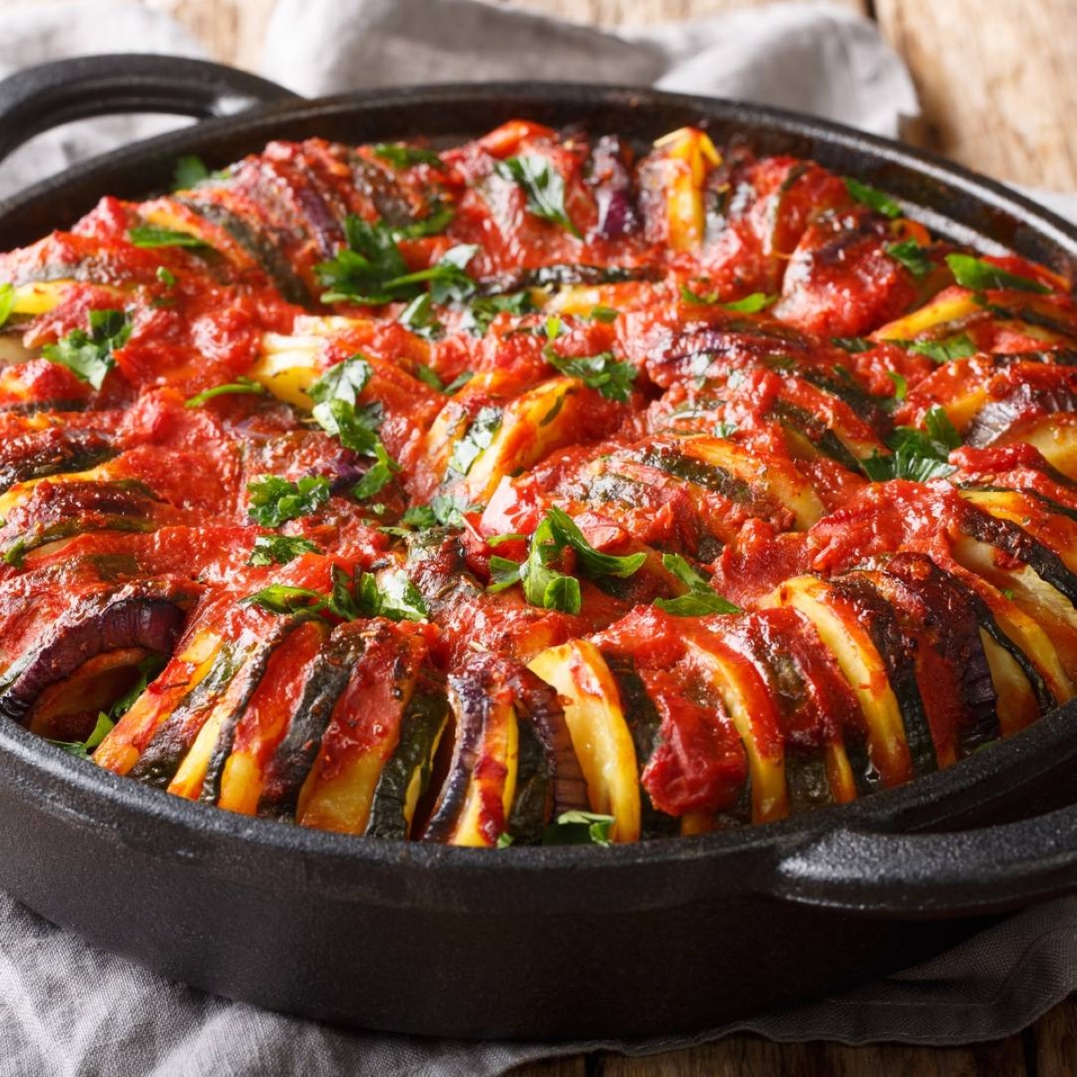 Delight in Greece's roast vegetable dish called Briam which uses easy-to-find ingredients.
