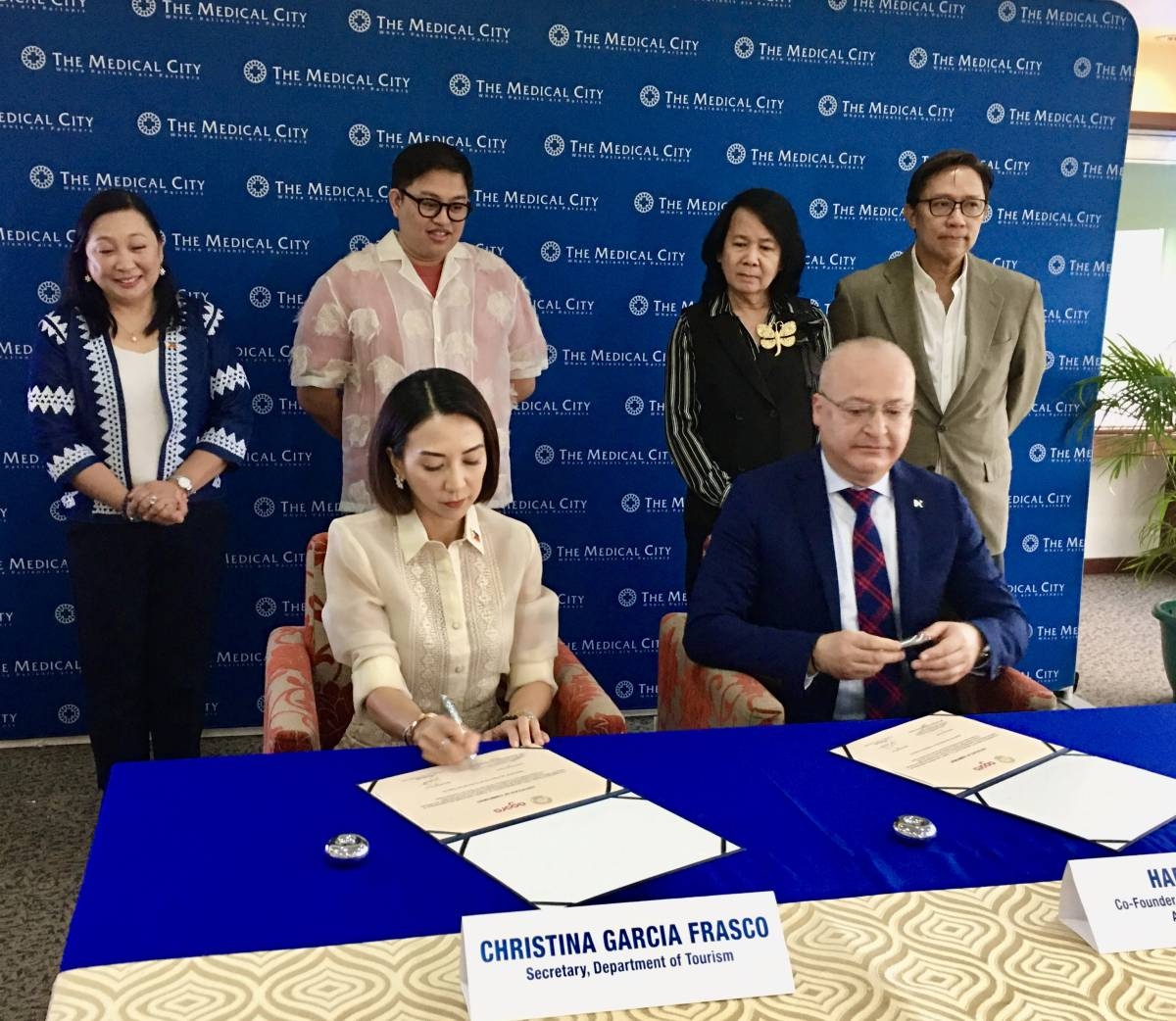 Witnessing signing ceremony were (from left) DoT Assistant Secretary Verna Covar-Buensuceso, Office of Product and Market Development (OPMD) Director Paulo Benito Tugbang, Agora Group Philippine Representative Angel Bognot and Eugenio Jose Ramos, MD, MBA, president and COO of The Medical City.