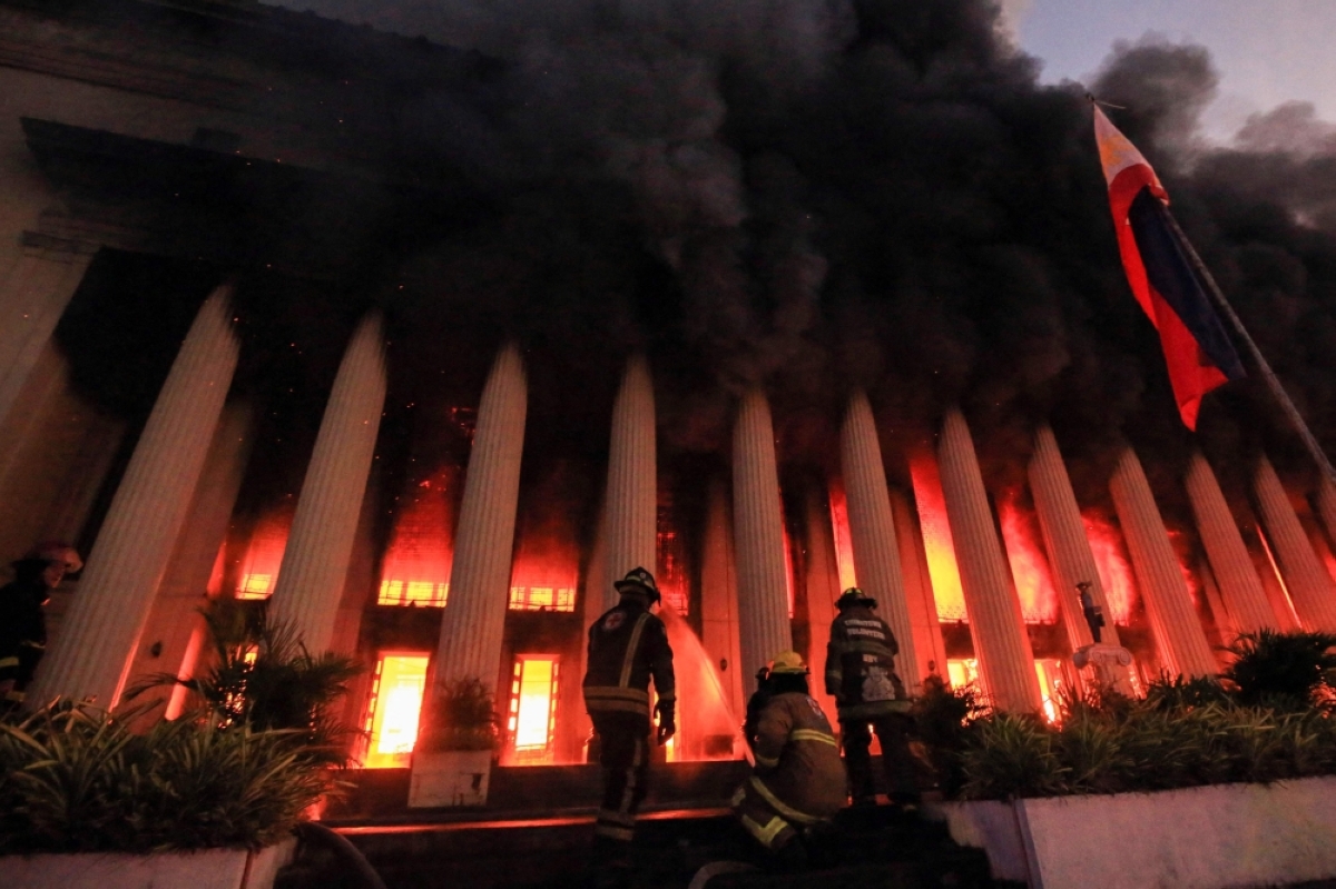 History burns 
Firefighters battle the fire at the Post Office building in Manila on Monday, May 22, 2023. AFP Photo