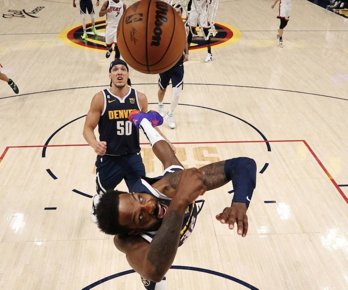 Jeff Green of the Denver Nuggets crashes to the floor under the basket during the first half in Game Two of the 2023 NBA Finals at Ball Arena on June 4, 2023 in Denver, Colorado. AFP PHOTO