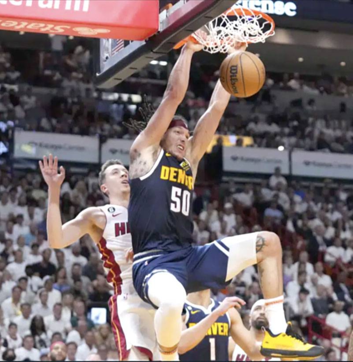 SLAM DUNK Denver Nuggets forward Aaron Gordon dunks the ball during the first half of Game 4 of the NBA Finals against the Miami Heat on Friday, June 9, 2023, in Miami. AP PHOTO