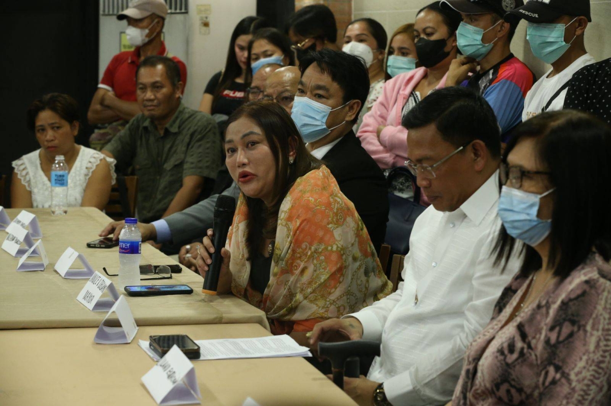 Pamplona Mayor Janice Degamo, widow of Negros Oriental governor Roel Degamo; lawyer Levi Baligod, families of other victims who were killed in the assassination of Degamo, lawyer Levi Baligod, and suspects attend a preliminary investigation at the Department of Justice (DoJ) in Manila on Tuesday, June 13, 2023. The DoJ, however, cancelled the investigation after prime suspect and Negros Oriental Rep. Arnolfo Teves Jr. and his lawyer Ferdinand Topacio failed to appear. PHOTO BY RENE H. DILAN