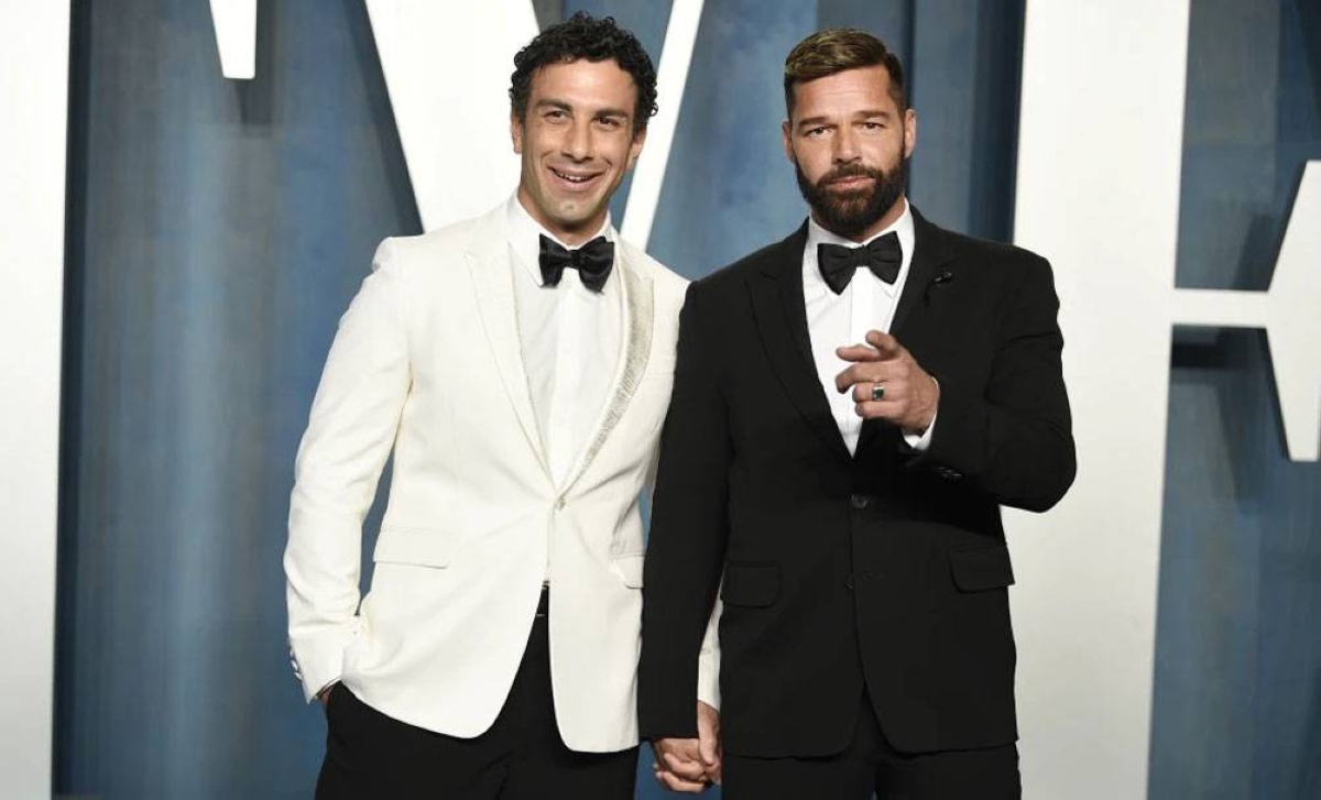 ALL SMILES Jwan Yosef, left, and Ricky Martin appear at the Vanity Fair Oscar Party in Beverly Hills, California, on March 27, 2022. PHOTO BY EVAN AGOSTINII/INVISION/AP FILE PHOTO