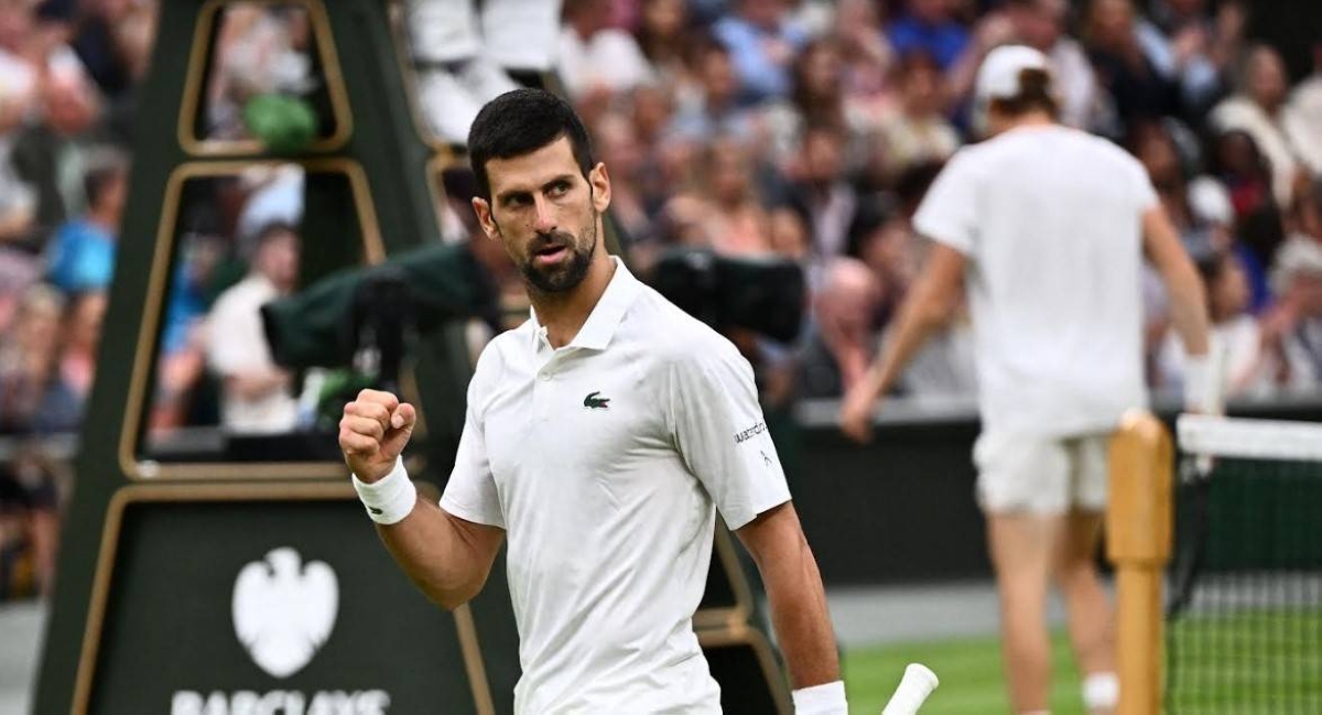 Serbia's Novak Djokovic celebrates winning a point against Italy's Jannik Sinner during their men's singles semi-finals tennis match on the twelfth day of the 2023 Wimbledon Championships at The All England Lawn Tennis Club in Wimbledon, southwest London, on Friday, July 14 (Saturday, July 15, in Manila). PHOTO BY SEBASTIEN BOZON / AFP