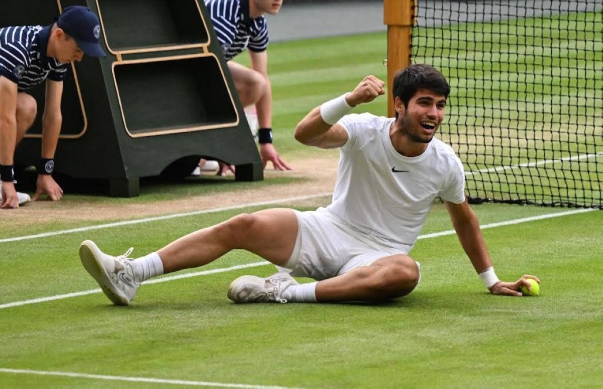 Spain's Carlos Alcaraz celebrates beating Serbia's Novak Djokovic during their men's singles final tennis match on the last day of the 2023 Wimbledon Championships at The All England Tennis Club in Wimbledon, southwest London, on Sunday, July 16 (Monday, July 17, in Manila). PHOTO BY GLYN KIRK / AFP