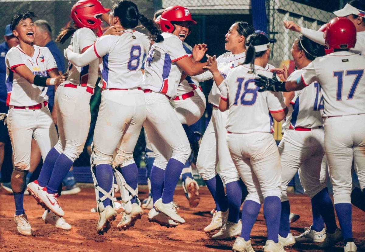 The Philippine Blu Girls celebrate after scoring an upset 6-5 victory over Italy in group C at the Women's Softball World Cup in Italy. WBSC PHOTO