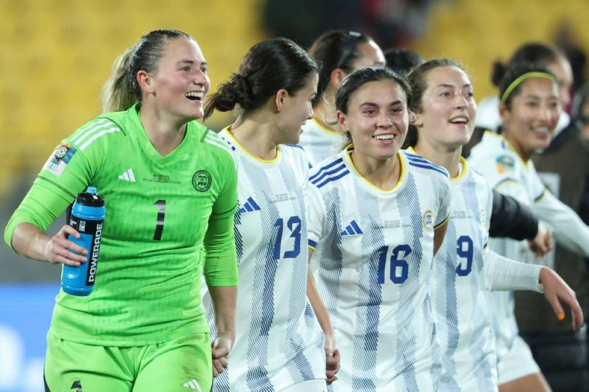 Philippines' goalkeeper Olivia McDaniel (left) celebrates with teammates after winning against New Zealand in their 2023 Women's World Cup Group A football match at Wellington Stadium in Wellington on July 25, 2023. AFP PHOTO