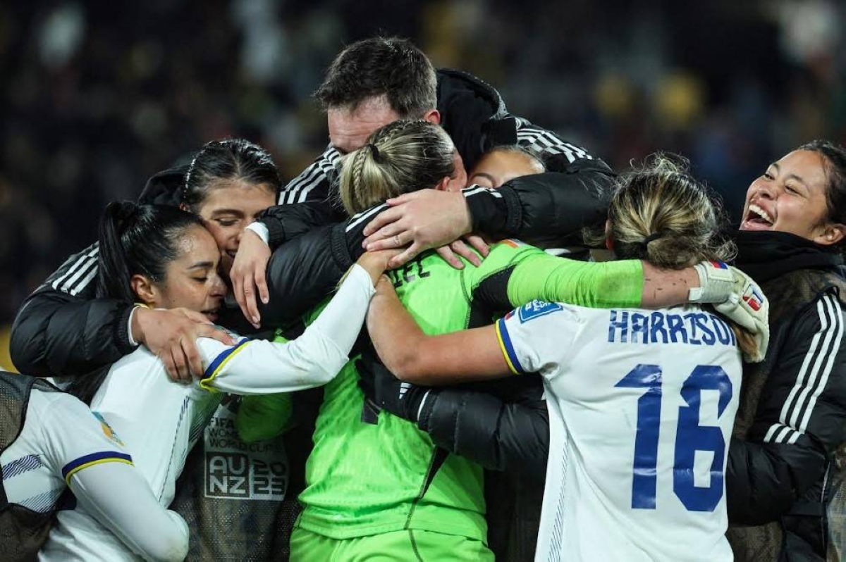Philippines' goalkeeper Olivia McDaniel (center) celebrates with teammates after winning against New Zealand in their 2023 Women's World Cup Group A football match at Wellington Stadium in Wellington on July 25, 2023. AFP PHOTO