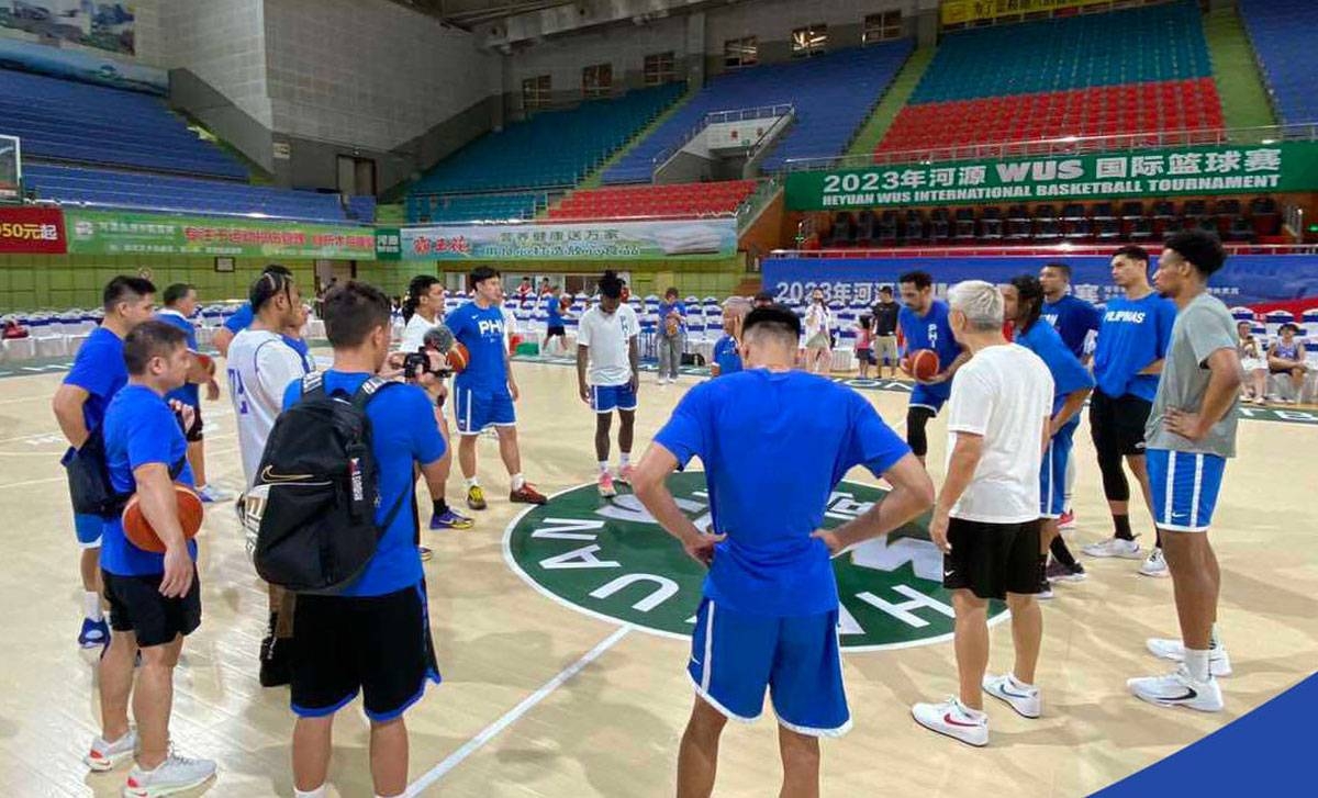 The Philippine men's basketball team huddles at mid-court during a practice session in Guangdong, China on Thursday, July 3, 2023. SBP PHOTO