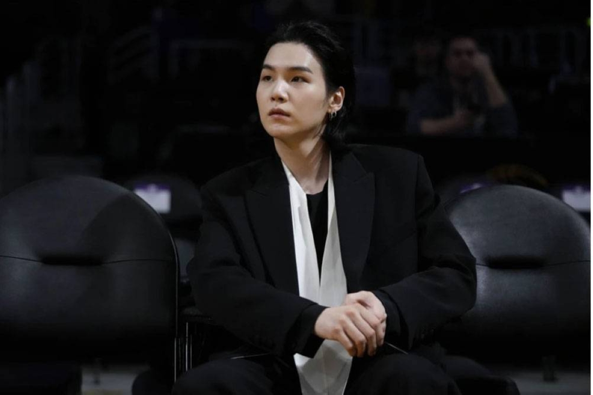 IN THE MILITARY BTS member Suga attends an NBA basketball game between the Los Angeles Lakers and the Dallas Mavericks on Jan. 12, 2023, in Los Angeles. Suga has become the third member of BTS to begin South Korea’s compulsory military service. BTS’ label, Big Hit Music, said in a statement on Monday, Aug. 7, 2023, that Suga “has initiated the military enlistment process by applying for the termination of his enlistment postponement.” AP FILE PHOTO