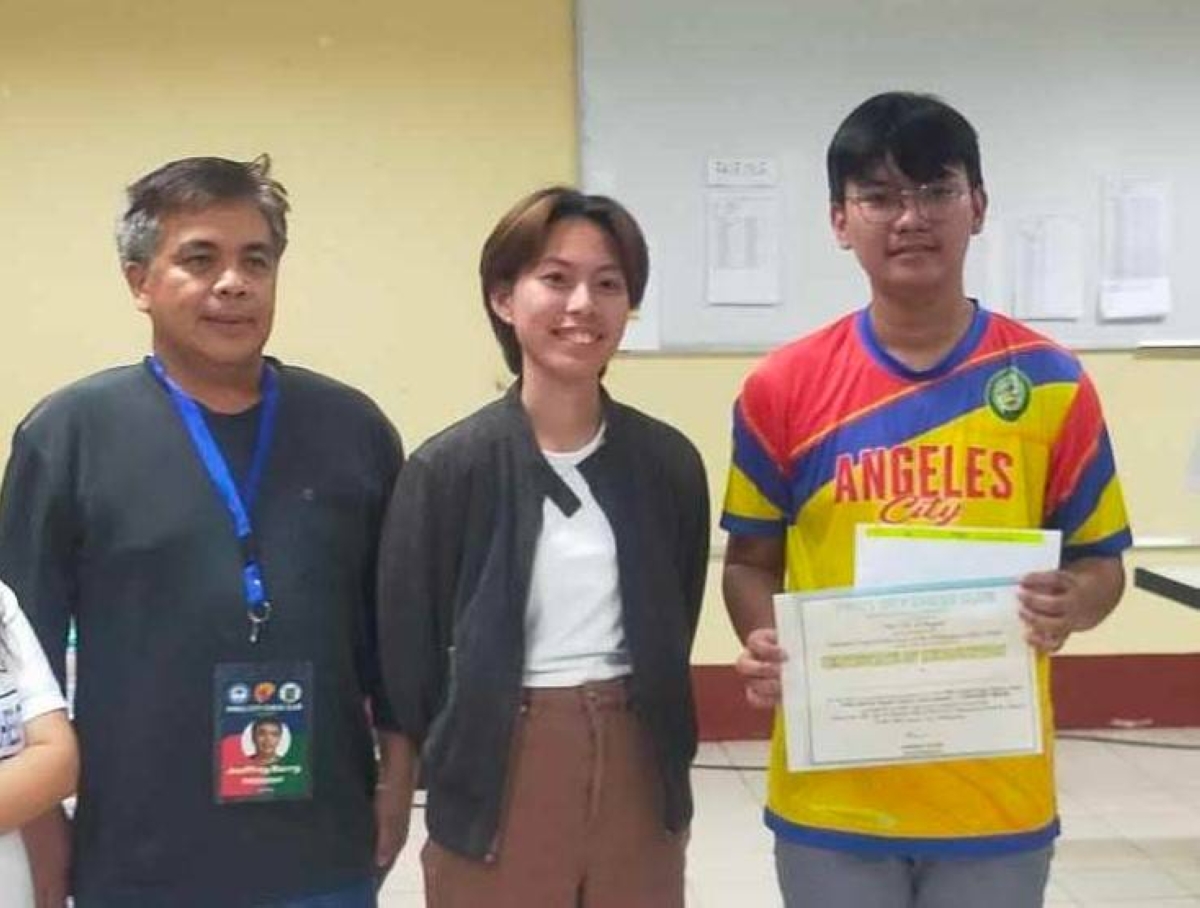 Tiv Omanagay (right) bagged 4th place in a FIDE rated rapid chess tournament in Baguio City last Saturday. CONTRIBUTED PHOTO