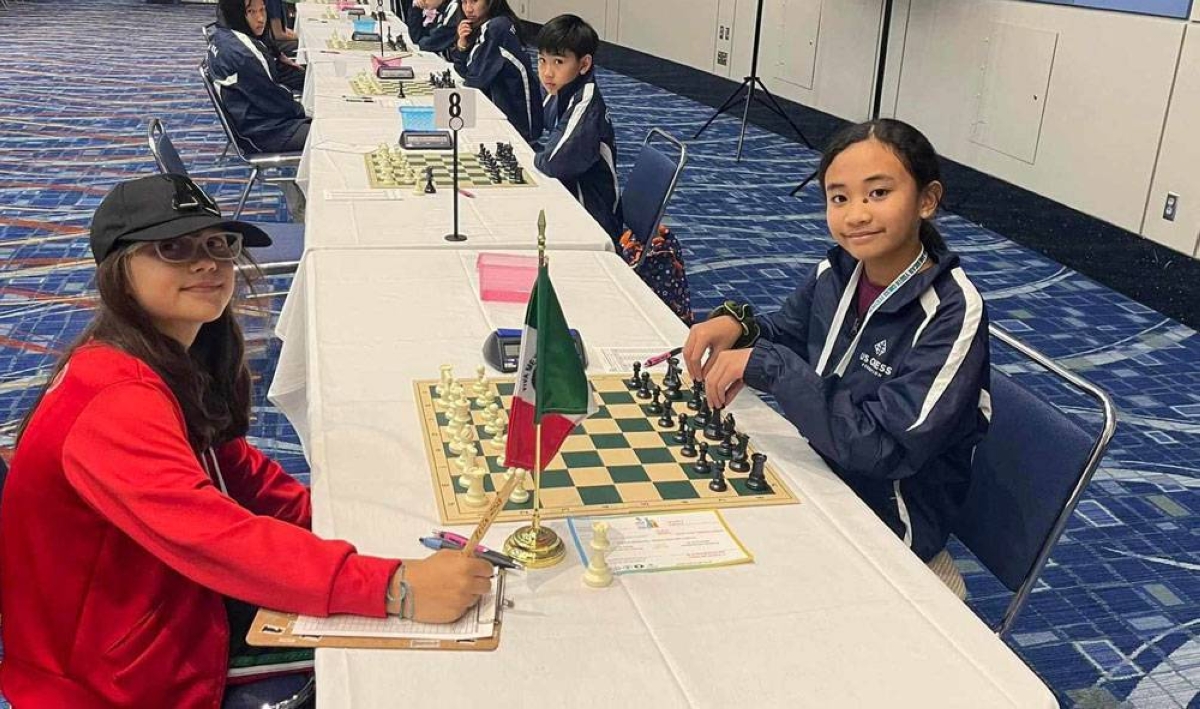 Filipino-American Megan Paragua (right), niece of Grandmaster Mark Paragua, takes on Antia Vazquez Sanchez of Mexico in the first round. CONTRIBUTED PHOTO