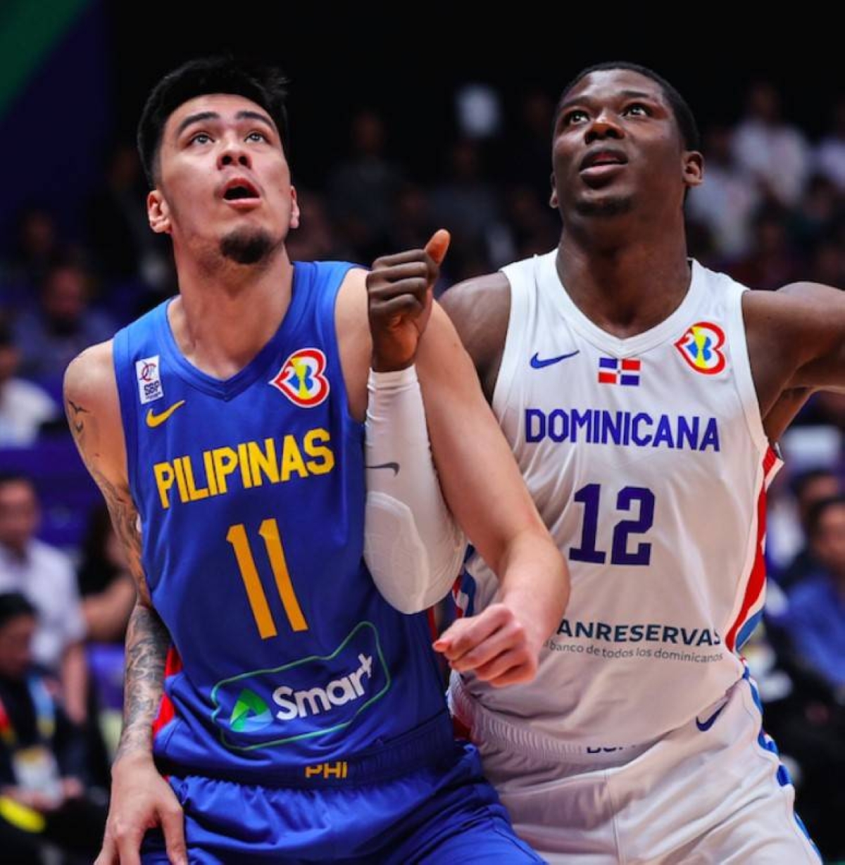 Gilas Pilipinas’ Kai Sotto (left) and Dominican Republic’s Angel Delgado battle for the rebound during the Philippines-Dominican Republic FIBA World Cup game at the Philippine Arena on Friday evening, Aug. 25, 2023.PHOTO BY RIO DELUVIO