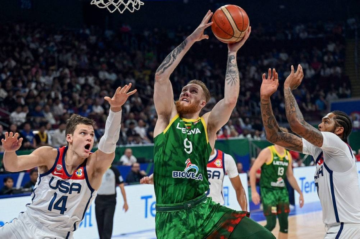 Lithuania’s Ignas Brazdeikis shoots the ball during the FIBA Basketball World Cup second round match between USA and Lithuania at Mall of Asia Arena in Pasay City on September 3, 2023. AFP PHOTO