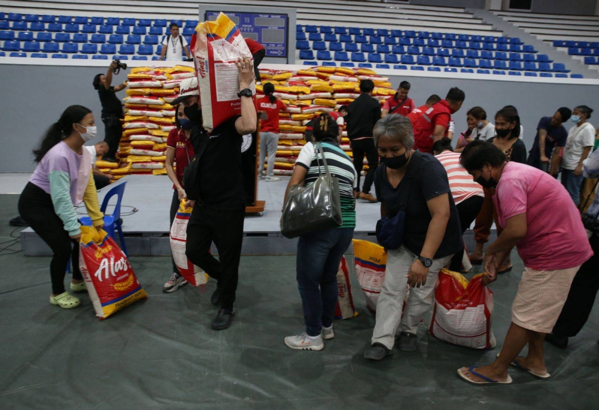 Marcos Cleanig Program Marcos distributes confiscated rice in Manila | The Manila Times