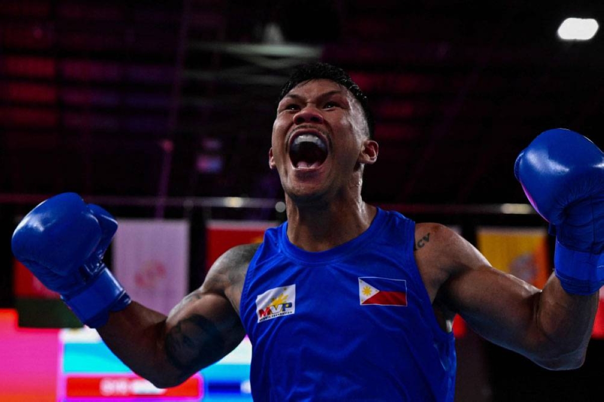 STILL A WINNER Eumir Marcial celebrates after winning against Syria’s Ahmad Ghousoon in the men’s 71-80kg semifinal boxing match during the 19th Asian Games in Hangzhou, China, on Wednesday, Oct. 4, 2023. PHOTO BY ISHARA KODIKARA/AFP