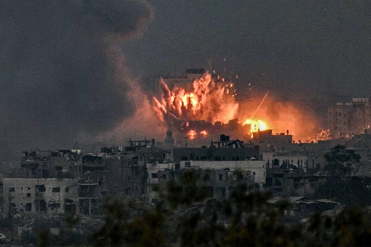 A fireball erupts during Israeli bombardment in the northern Gaza Strip on October 14, 2023. AFP PHOTO
