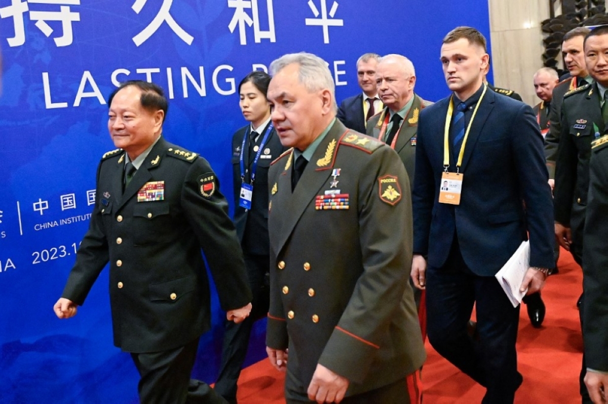MAKING AN ENTRANCE Zhang Youxia (front, left), China’s vice chairman of the Central Military Commission, and Russian Defense Minister Sergei Shoigu (front, right) arrive at the Xiangshan Forum in the Chinese capital Beijing on Monday, Oct. 30, 2023. AFP PHOTO