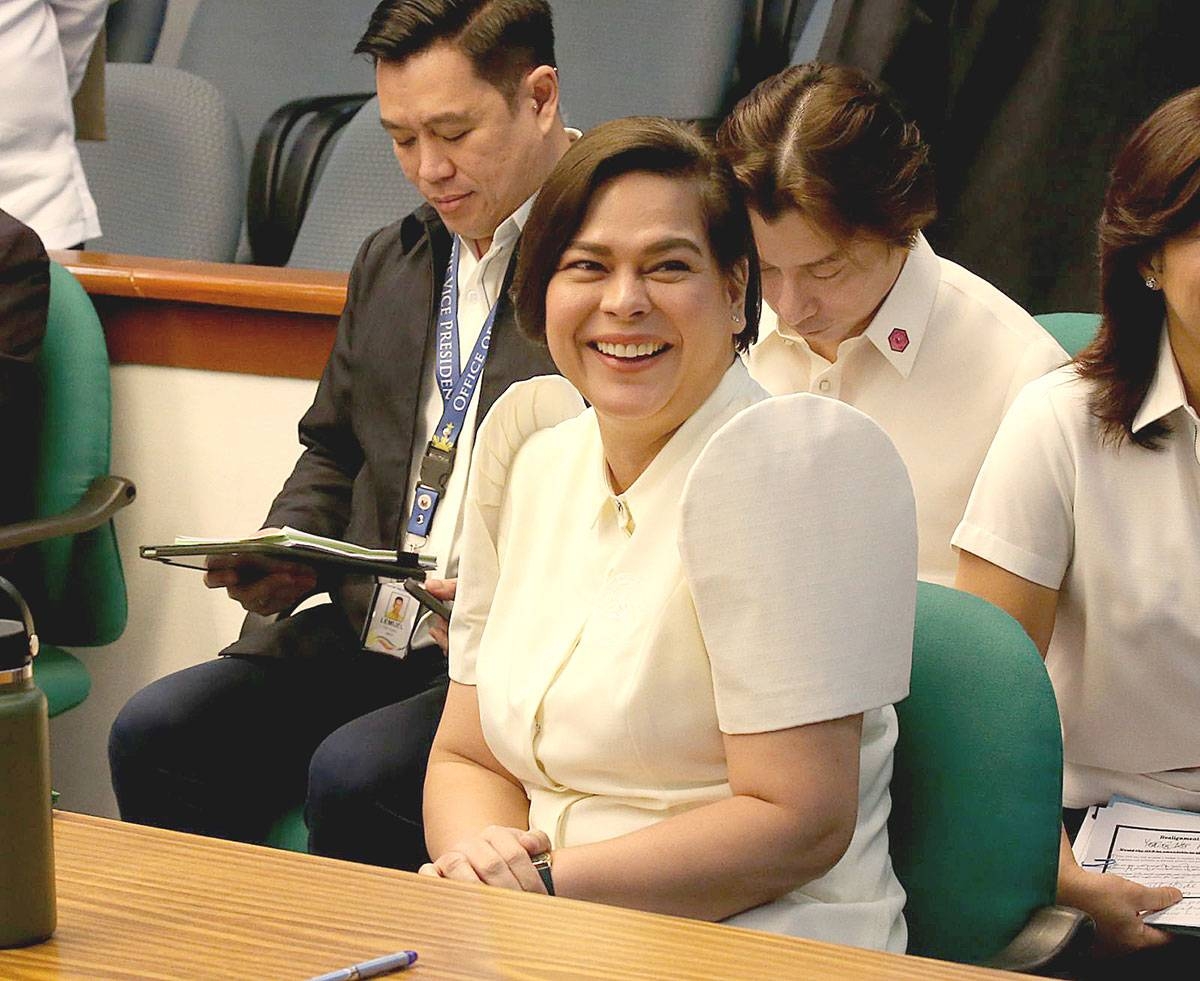 NO MORE Vice President Sara Duterte is all smiles as she attends a Senate hearing on her office’s proposed 2024 budget, which includes the controversial confidential funds, on Thursday, Nov. 9, 2023. Duterte, however, through her spokesman Michael Poa, said she was giving up the fund because it was a ‘divisive’ issue. PHOTO BY RENE H. DILAN
