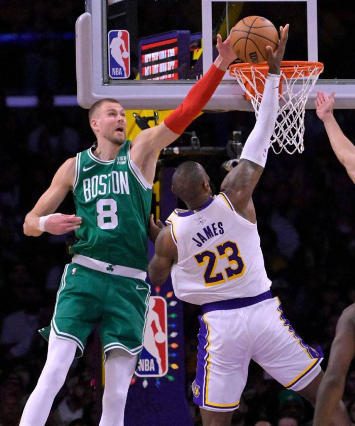 Kristaps Porzingis of the Boston Celtics blocks a shot by LeBron James of the Los Angeles Lakers in the second half at Crypto.com Arena on Monday, Dec. 25, 2023, in Los Angeles, California.AFP PHOTO