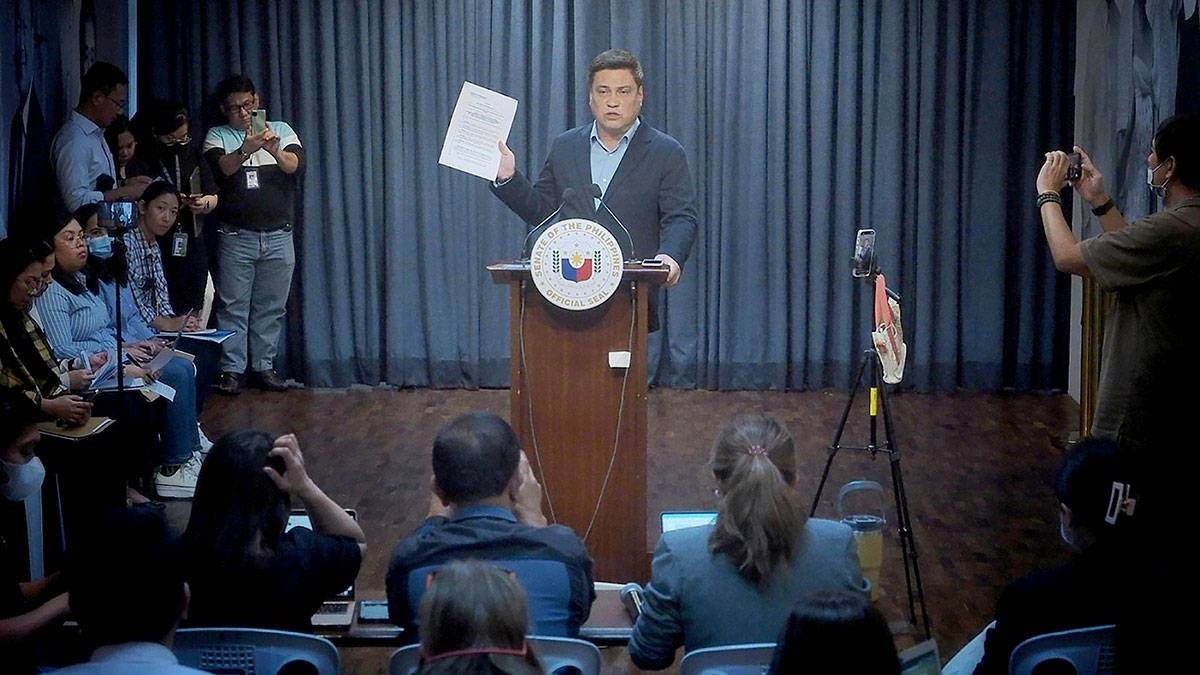 Filed Senate President Juan Miguel Zubiri holds a copy of a resolution that seeks to start the discussions on amending the economic provisions of the 1987 Constitution. Contributed photo