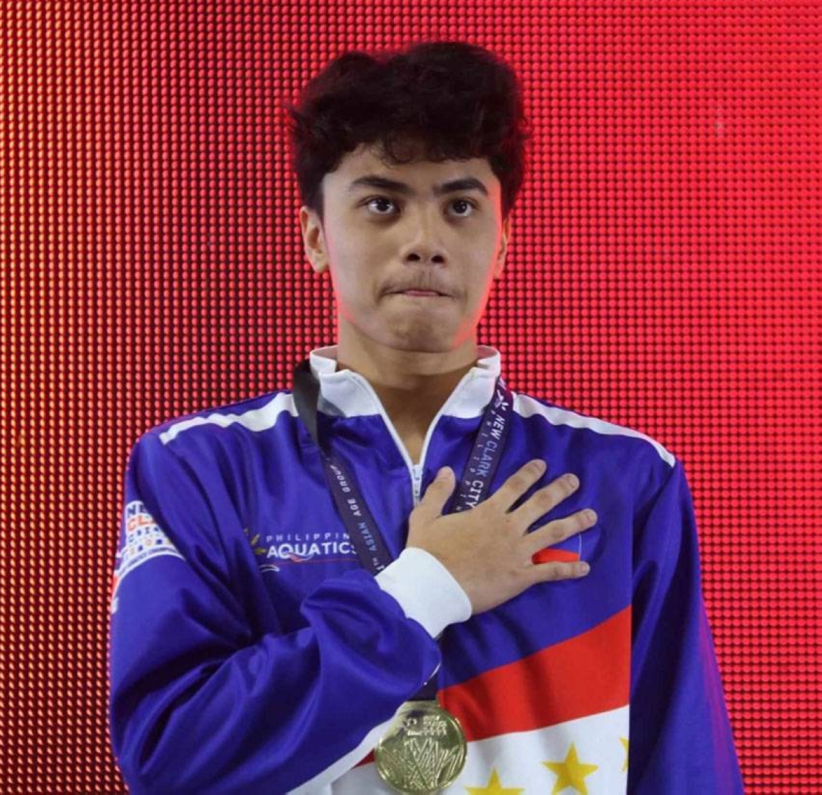 FIRST GOLD Jamesray Ajido gave the Philippines its first-ever gold medal in the Asian Age Group Championships when he topped the 12 to 14 boys 100-m butterfly event on Wednesday, Feb. 28, 2024, at the New Clark City Aquatics Center. CONTRIBUTED PHOTO