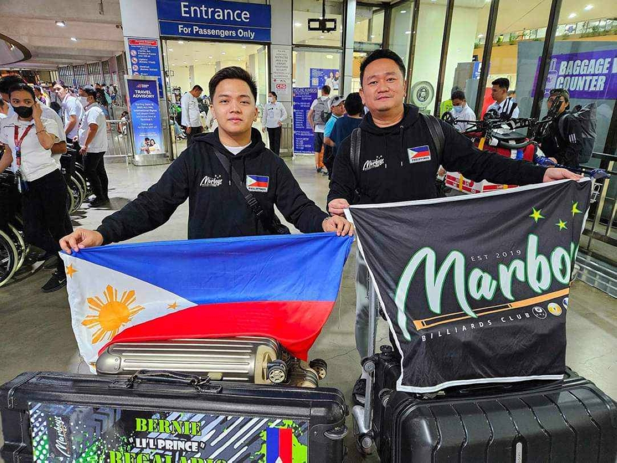 Bernie Regalario (left) and Marboys Billiards Club President and CEO JR Velasco  CONTRIBUTED PHOTO