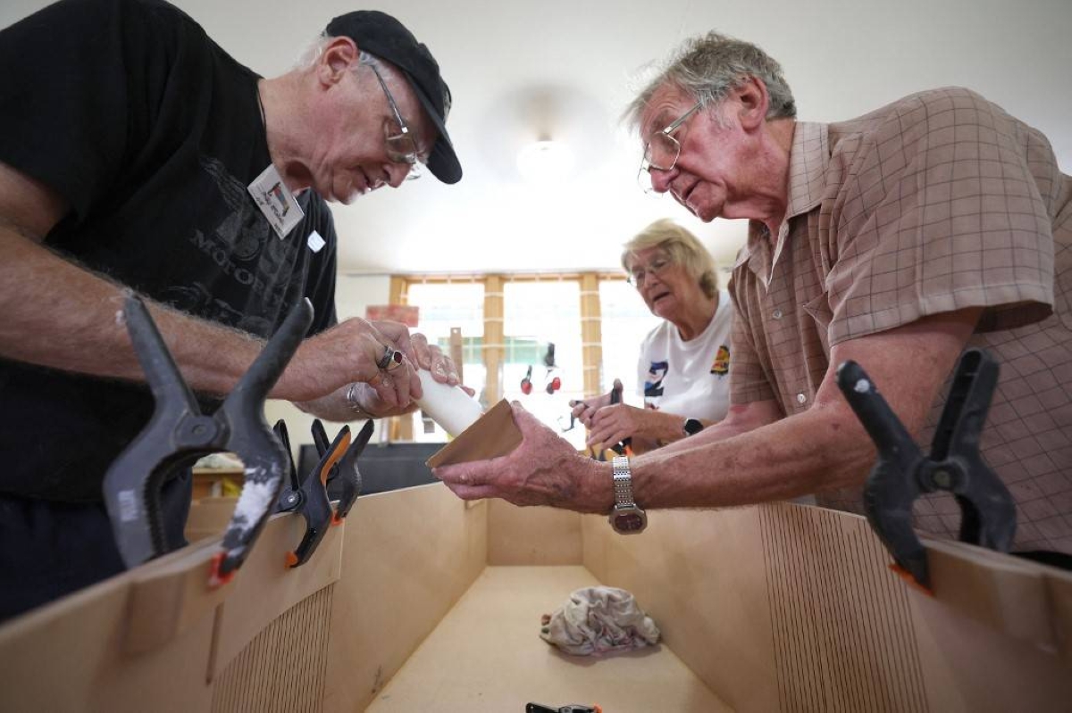 SENIORS’ MOMENT Members of a coffin club work on a coffin during a workday at the group’s workshop in the city of Hastings, northeastern New Zealand on Feb. 27, 2024. AFP PHOTO