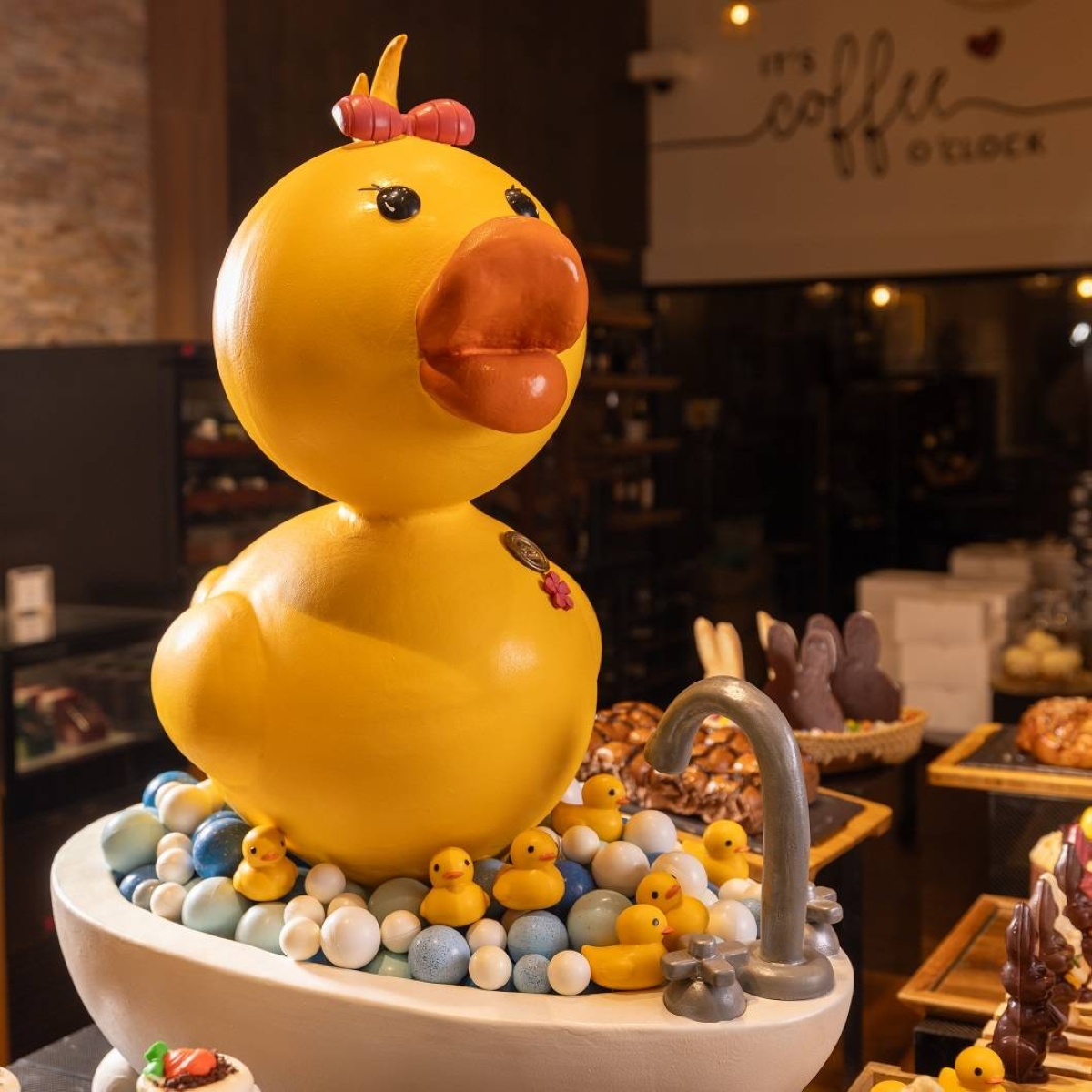 A showstopping 20-kilo gigantic Easter chocolate duckling in a bubble bath dominates Café Society’s showcase of whimsical Easter chocolates and treats carved by Head Chocolatier Tweet Obsequio and her team, and available until March 31.