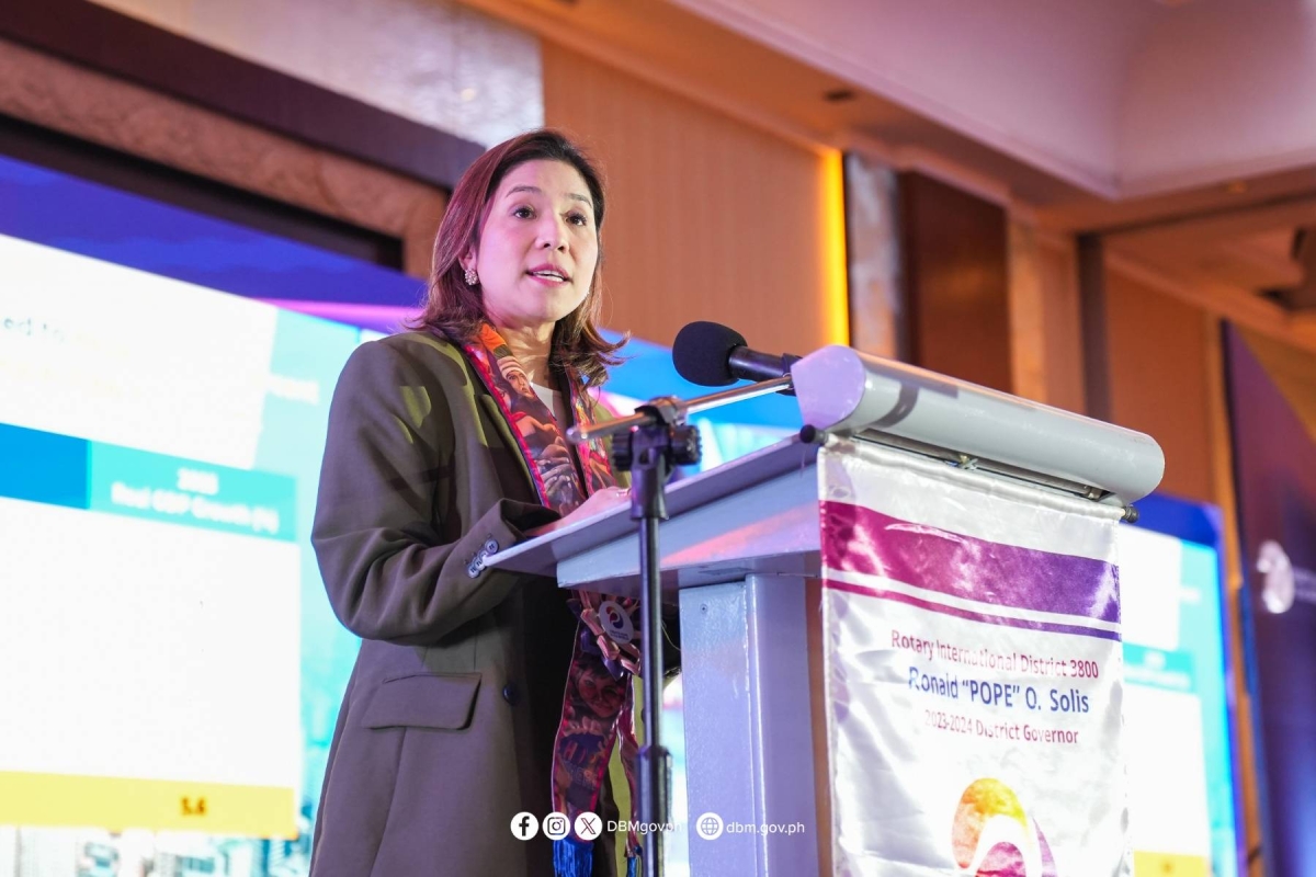 Department of Budget and Management (DBM) Secretary Amenah Pangandaman speaks during the District Conference of Rotary International District 3800 in Mandaluyong City on March 22, 2024, highlighting the participatory initiatives of DBM. CONTRIBUTED PHOTO