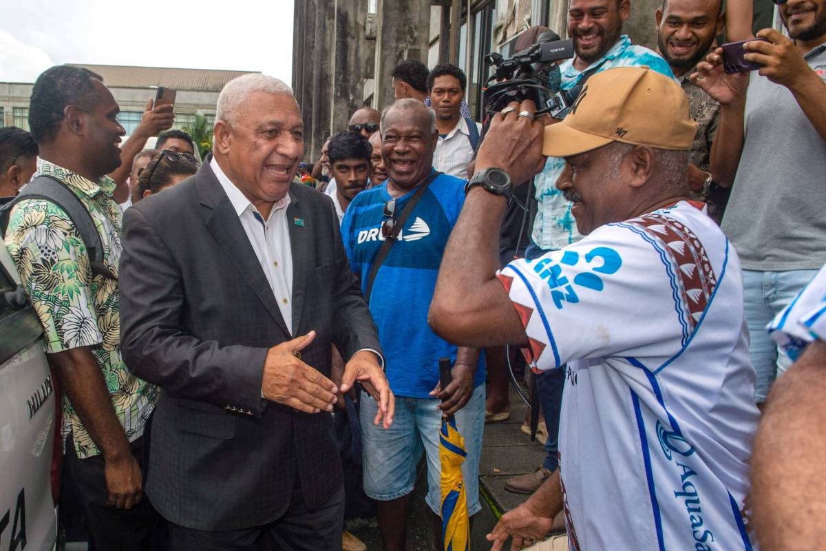 NO JAIL TERM Fiji’s former prime minister Frank Bainimarama meets supporters as he leaves the Magistrates Court in Suva on Thursday, March 28, 2024. AFP PHOTO